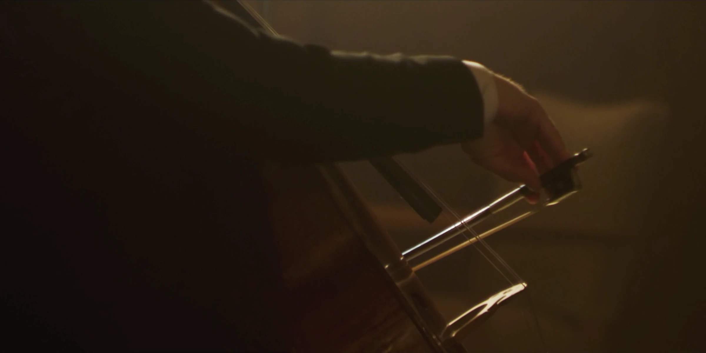 Detail of the cello and bow