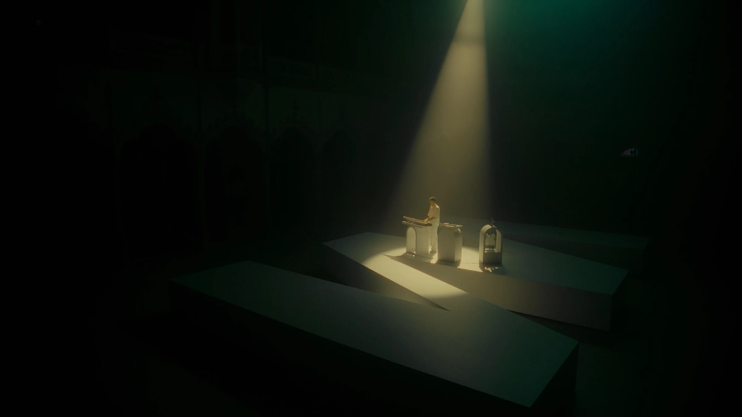 Wide stage beneath a single spotlight