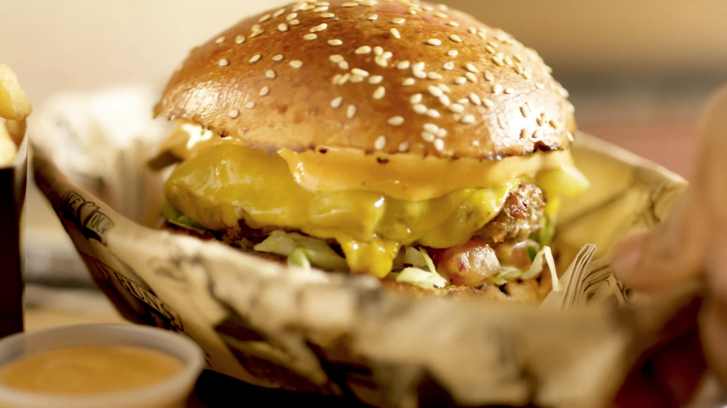 Cheeseburger in its paper-lined basket