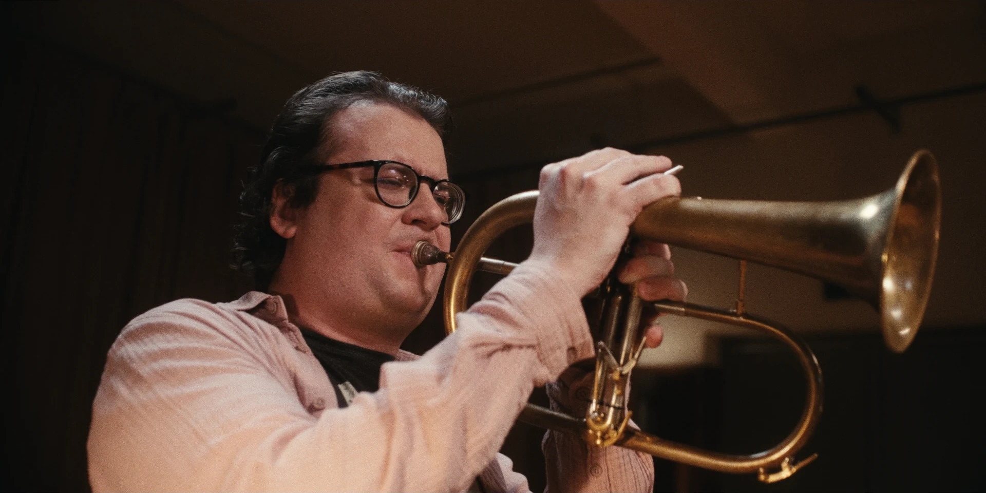 Close portrait of the flugelhorn player