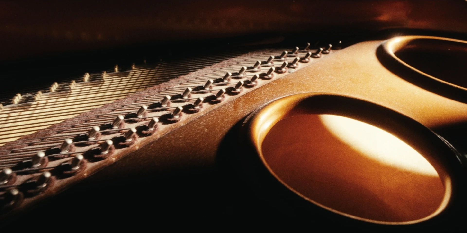 Golden details inside the grand piano